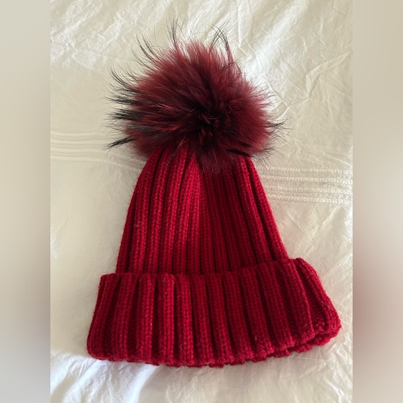 Red pom pom hat